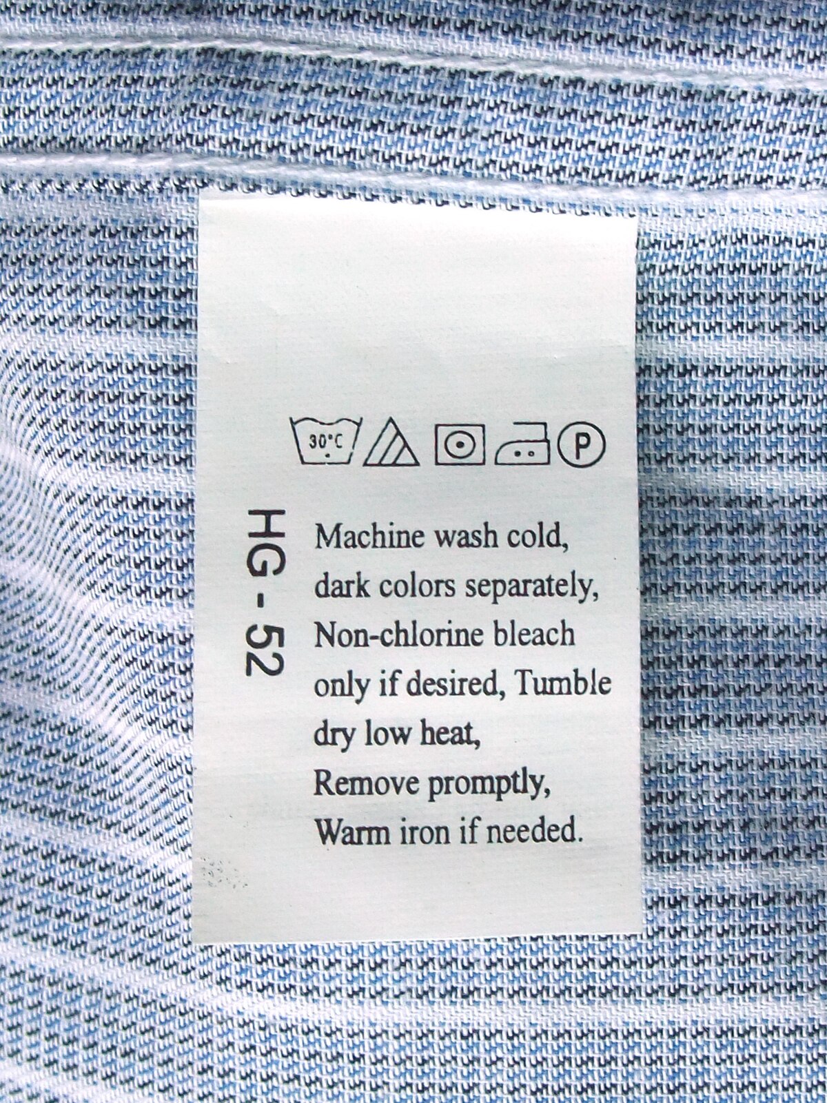 Care label sewn into a garment side seam
