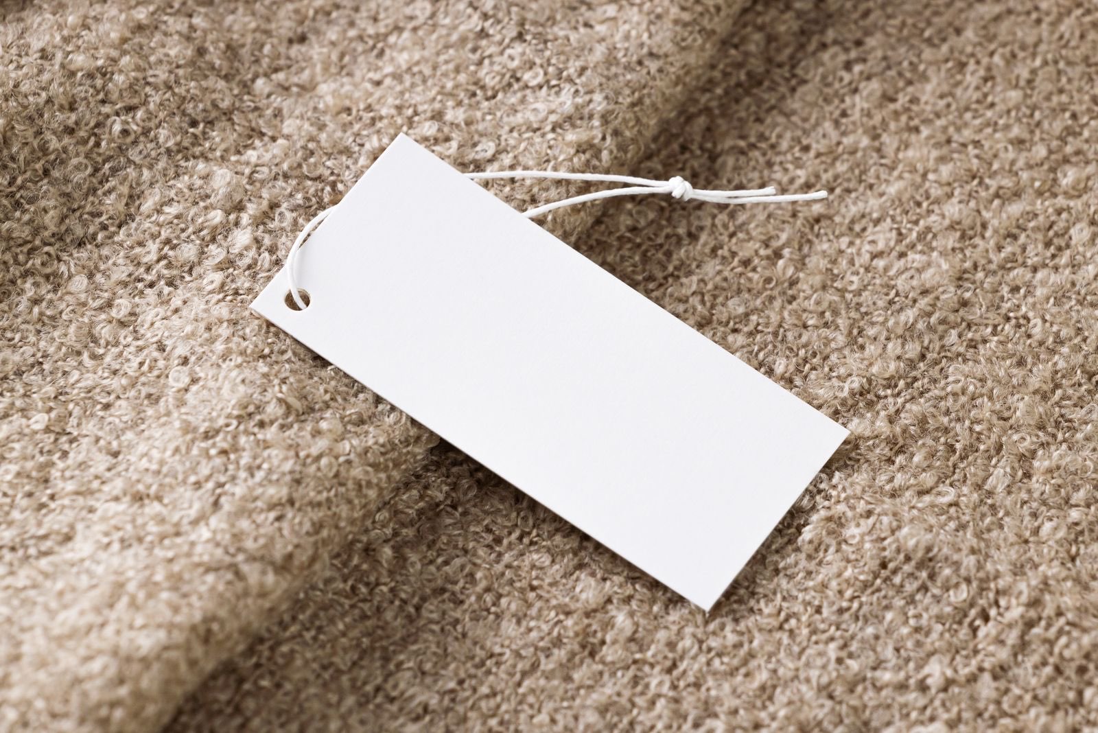 Branded hang tag attached to a garment